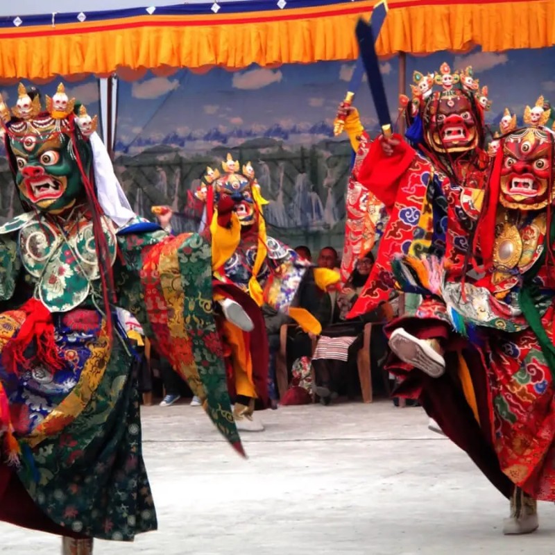 Masked Buddhist dancers performing the Mani Rimdu festival dance at Tengboche Monastery