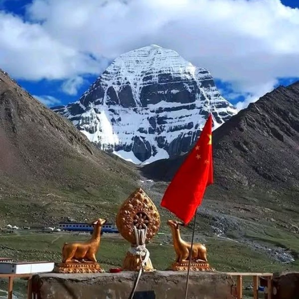 North face of Mount Kailash from Derapuk with shrine and red flag in foreground
