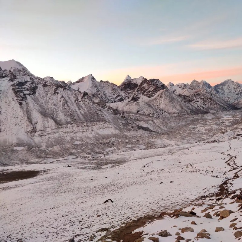 Snow-covered Khumbu Glacier and Himalayan peaks near Gorakshep in the Everest region.