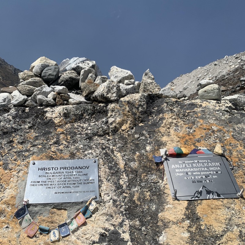 Memorial plaques at Thukla Pass honoring climbers in Nepal’s Everest region.